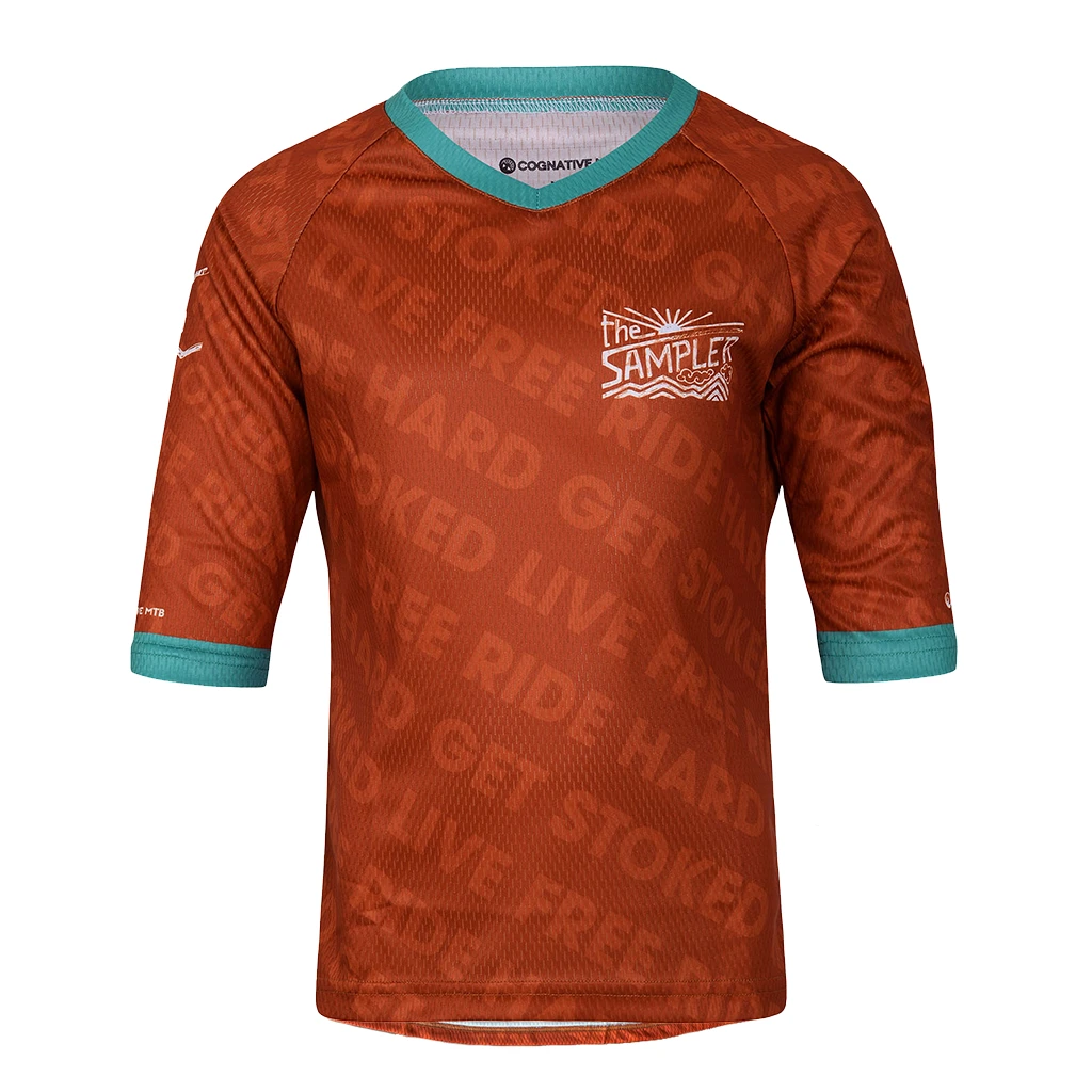 The Singletrack Sampler Youth 3/4 Sleeve Tech 2.0 MTB Jersey (Orange) 1 The Singletrack Sampler Youth 3/4 Sleeve Tech 2.0 MTB Jersey (Orange)