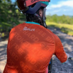 The Singletrack Sampler Men's 3/4 Sleeve Tech 2.0 Jersey (Orange/Teal) -Cognativemtb Shop jersey3